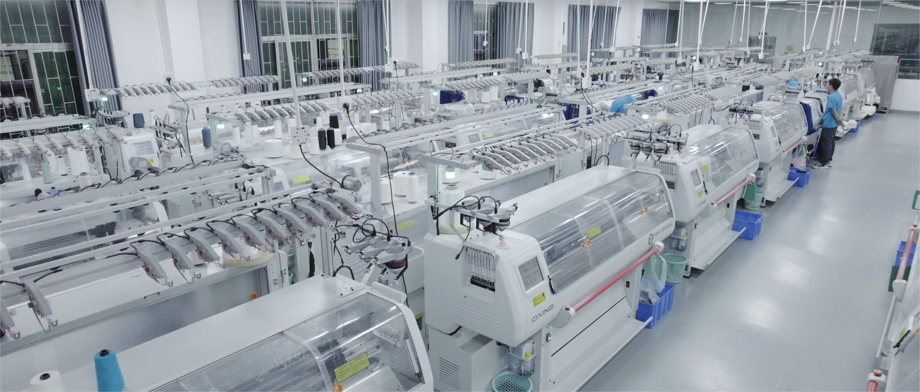 There are so many flat knitting machines at the Guoou Factory