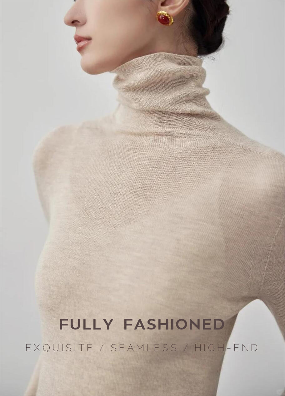 A woman wearing a premium light apricot 100% wool fully fashioned sweater